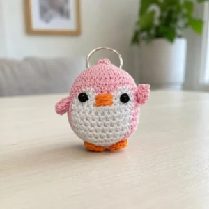 Crochet penguin keychain Pakistan in handmade pink design