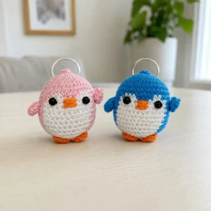 Handmade Crochet Penguin Keychain β Pink & Blue alternate view